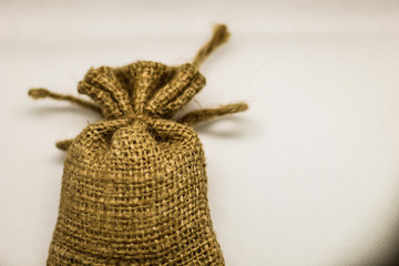 Small linen bag on a white background