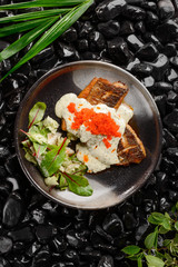 Sea bass steak with sauce