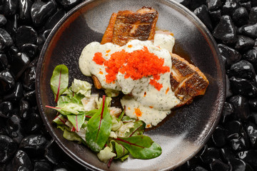 Grilled seabass with caviar