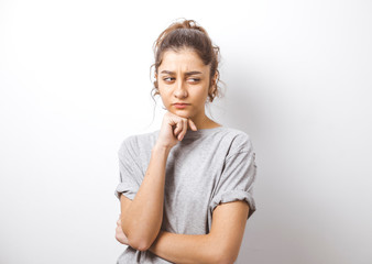 Angry Indian girl on a white background. 