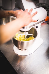 Chef using mixer