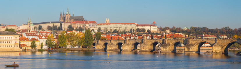 Fototapeta na wymiar PRAGUE, CZECH REPUBLIC - OCTOBER 11, 2018:The panorama of Charles Bridge, Castle and Cathedral withe the Vltava river.