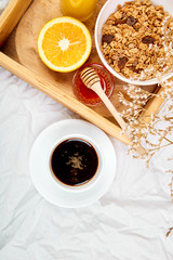 Good morning. Breakfast on white bed sheets.