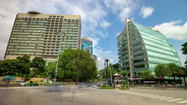 sunny day bangalore city famous downtown traffic street square panorama 4k timelapse india