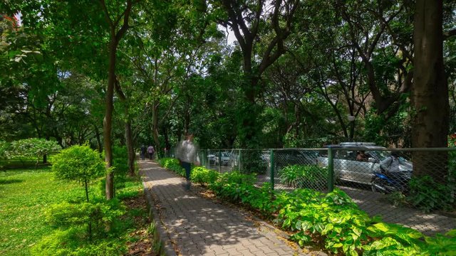 sunny day bangalore city famous central park traffic road panorama 4k timelapse india