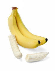Whole bananas and peeled banana on a white isolated background. Close-up. View from above.