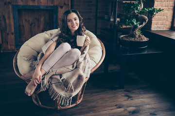Close up photo sweet beautiful brunette she her lady kindhearted melting living room morning relaxing hot beverage covered blanket wearing domestic home apparel clothes outfit sit comfy arm-chair