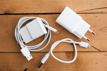 White adapter with USB cables 