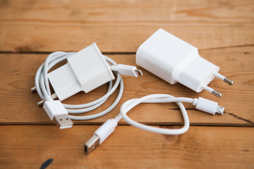 White adapter with USB cables 