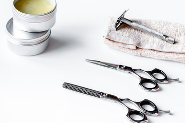 white desktop with tools for shaving beards
