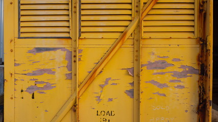 Yellow peeling paint texture background, grunge, full frame, copy space