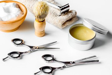 white desktop with tools for shaving beards
