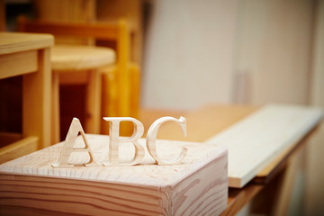 Alphabet ABC at woodworking workshop 