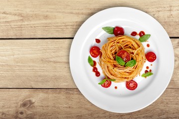 Delicious pasta on white plate on  background