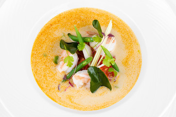Tom Yum soup thai food traditional cuisine with ingredient on white isolated background, top view