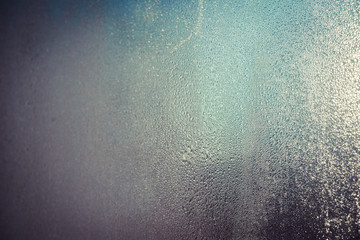 Fototapeta premium Foggy condensated window blurry textured outdoors background image