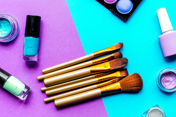 Obraz na płótnie Canvas set of decorative cosmetics on colorful background top view