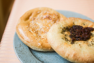 bun with jam on plate