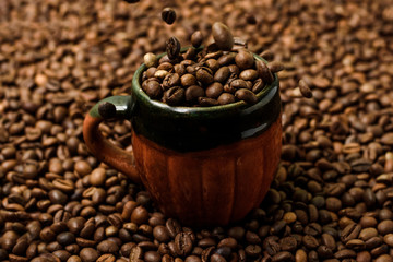 mug with grains of coffee