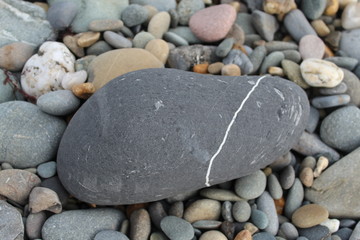 Various types of stones and pebbles taken on a stoney beach