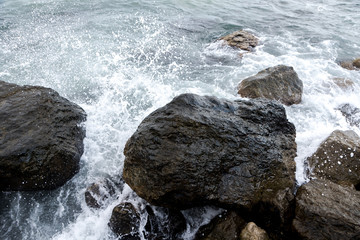 Sea waves, beating on the stones. Noisy sea. Coast of the Black Sea