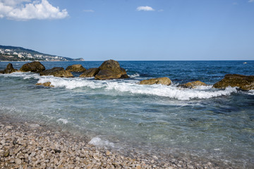 Sea waves, beating on the stones. Noisy sea. Coast of the Black Sea