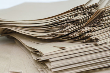 Side View Of Huge Stack of Recycled Paper close up. Business concept. Huge Stack of Recycled Paper envelopes closeup. 
