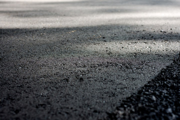 Laying of new asphalt. The new road. Road repair street.