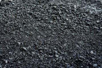 Laying of new asphalt. The new road. Road repair street.