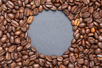 Coffee beans arranged with grey centre space for text