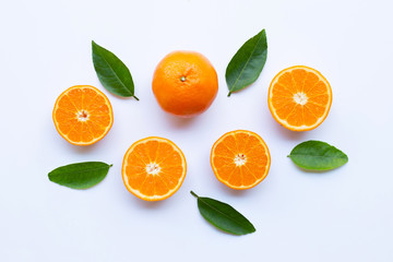 Fototapeta na wymiar High vitamin C. Fresh orange citrus fruit with leaves isolated on white