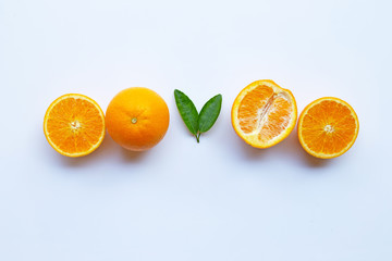 High vitamin C. Fresh orange citrus fruit with leaves isolated on white