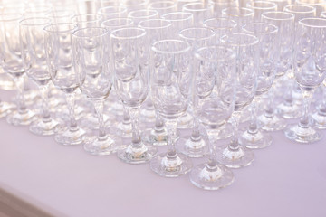 Blured background from wedding glasses filled with champagne