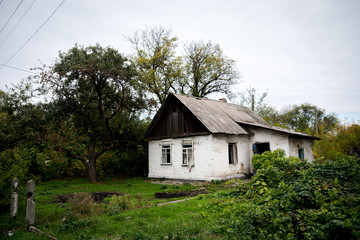 Fototapeta na wymiar Ruined house in the village
