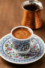 Black coffee in traditional Turkish cup