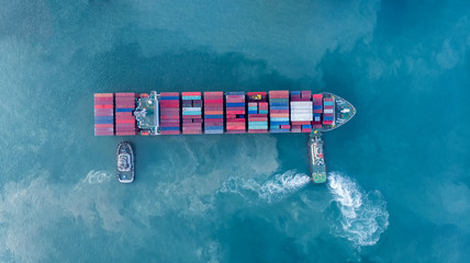 trug ship drag container ship vessel   to cargo international container yard port concept shipping...