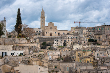 Obraz premium City view of Duomo Cattedrale Basilica Pontificia di Maria Santissima della Bruna (Madonna delle Grazie) in the Old City of Matera in the region of Basilicata, in Puglia, Italy. Capital culture 2019