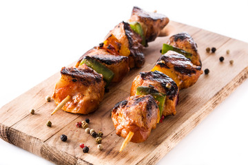Chicken shish kebab with vegetables isolated on white background.