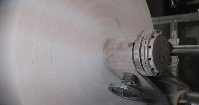 Rotation machine in printing house. Processing of secondary sources. Paper recycling. Large enterprise