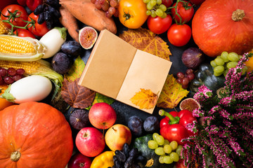 Autumn fruits vegetables and leaves. Healthy food background with autumnal vegetables and fruits. Thanksgiving day concept. Top view, copy space