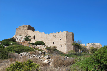 Fototapeta na wymiar General view of the hill with the ruins of Kritinia Castle, Kritinia Village, Rhodes Island, Greece