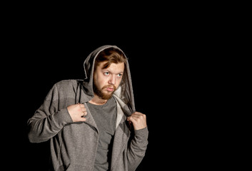  man with a beard on a black background