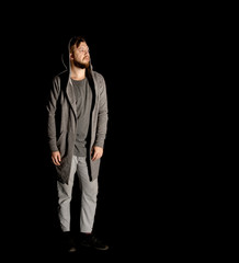  man with a beard on a black background