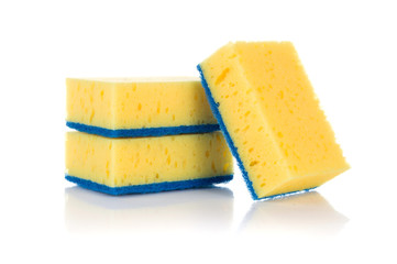 Group of yellow sponges for cleaning ware isolated on white background