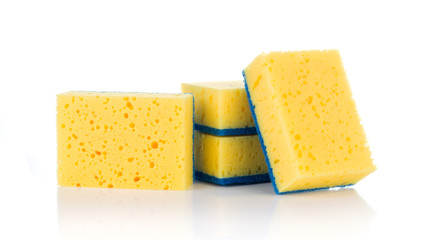 Group of yellow sponges for cleaning ware isolated on white background