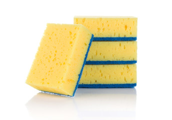 Group of yellow sponges for cleaning ware isolated on white background