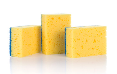 Group of yellow sponges for cleaning ware isolated on white background