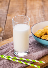 Glass of Milk with Straws and Cookies