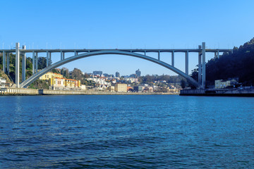 Fototapeta na wymiar Arrabida bridge, and the Douro river, in Porto