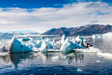 panorama of icebergs floating in the blue lagoon
